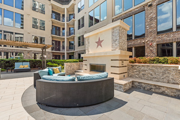 Pool fireplace area with seating