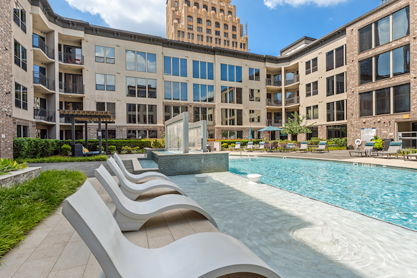 Pool lounge chairs in water